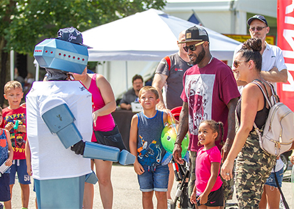 A crowd interacting with a robot