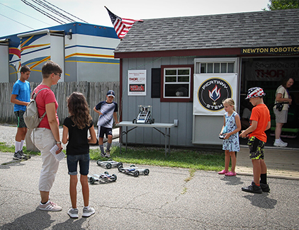 Children trying out Robotics